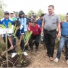 Ketua PWI Kuningan, Ondin Suterman saat menanam pohon di Kebun Raya Padabeunghar.